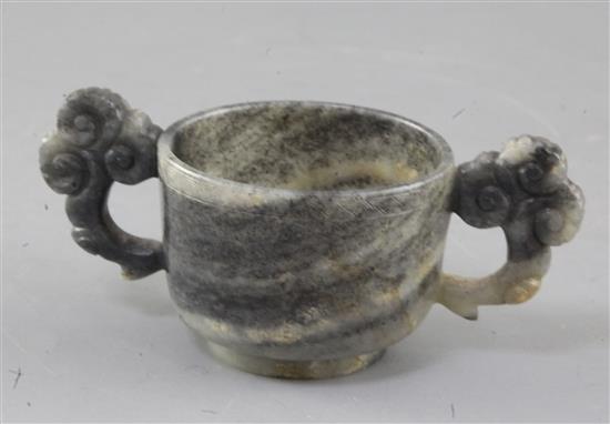 A Chinese grey and black speckled jade two handled cup, 17th/18th century, width 13.3cm